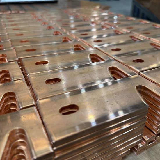 Punched and slotted copper components